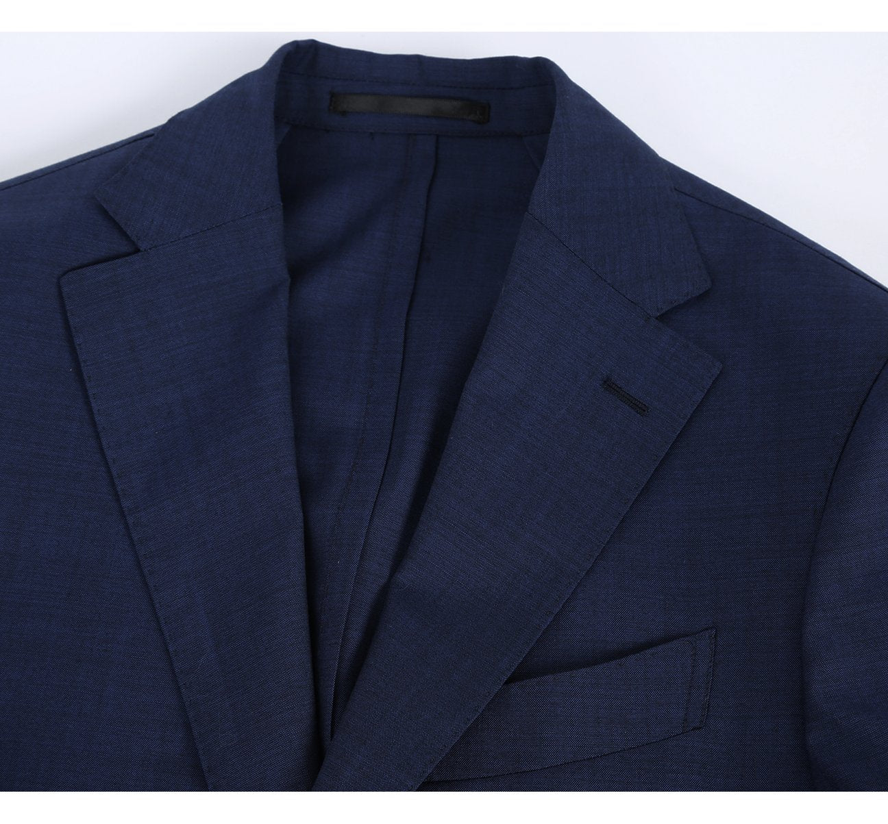 The Pellagio Navy Slim Fit Travel Suit, featuring a suit jacket and matching trousers with anti-microbial properties, nature stretch, and wrinkle resistance, showcased on a white background.