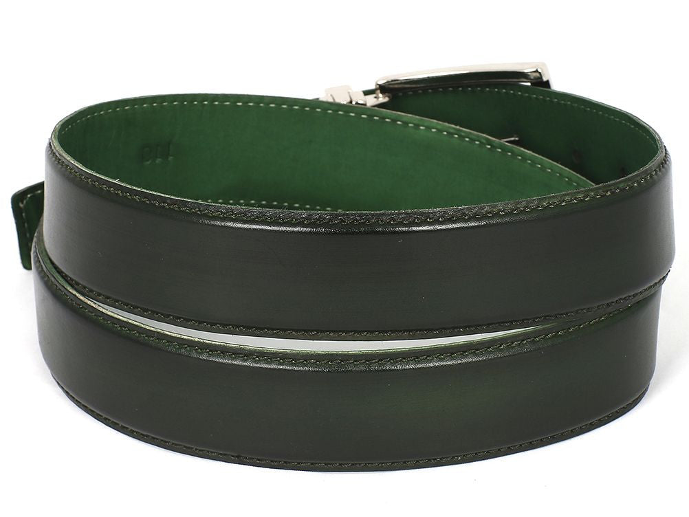 A customized leather belt in dark green hand-painted finish, featuring a silver buckle embossed with "PAUL PARKMAN," showcases exquisite craftsmanship and elegance. Made from genuine calfskin leather, this Paul Parkman Leather Belt (B01-DARK-GRN) is an ideal accessory for those who value artistry and sophistication.