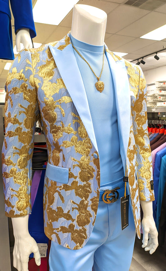 In a store setting, a mannequin showcases the INSOMNIA Super Slim Blazer 2 by Insomnia, featuring gold floral patterns, paired with a matching blue shirt and accessorized with a gold heart necklace.