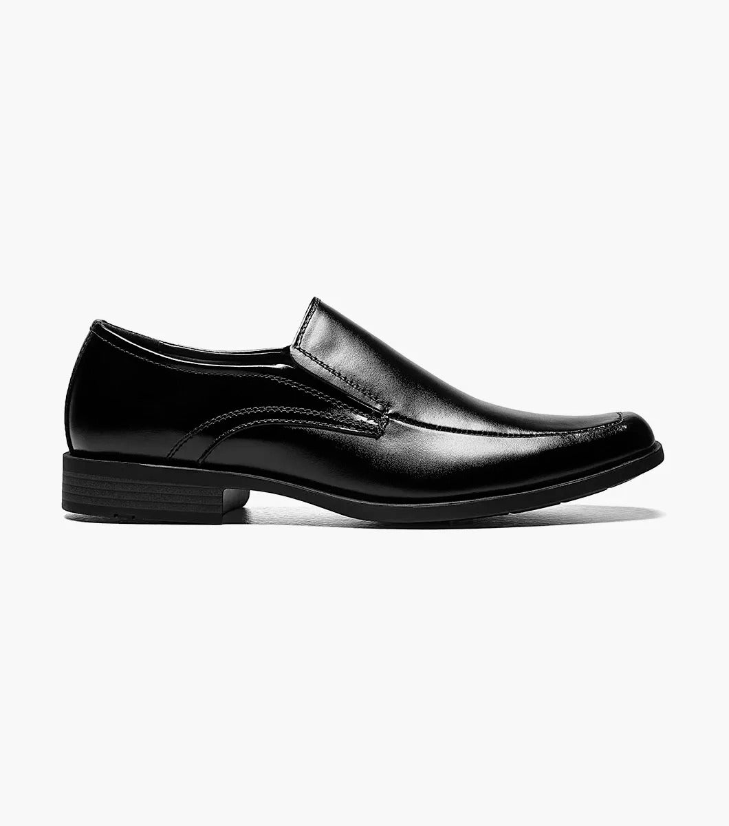 Stacy Adams Cassidy Moc Toe Loafer in black, made from genuine leather with a square toe and low heel, featuring a cushioned insole, displayed on a white background.