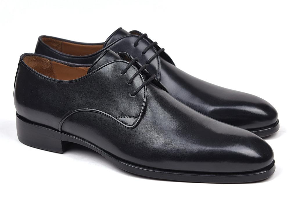 A pair of Paul Parkman Black Leather Derby Shoes - 34DR-BLK in Italian calfskin, featuring classic lace-up styling, with one shoe upright and the other on its side to display the sole.