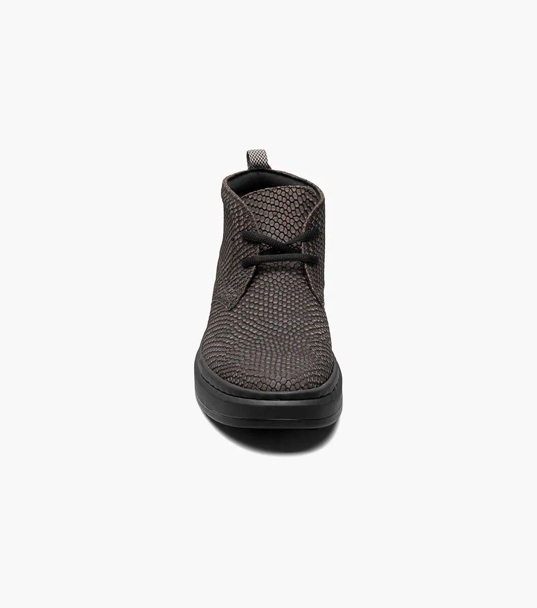 The Stacy Adams - CAI Plain Toe Chukka Boot in Black/Gray, product number 25566-975, is displayed on a white background. It features a fully cushioned insole for added comfort, with black laces and a black sole.