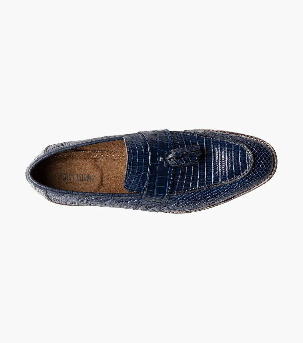 The Stacy Adams PACETTI Leather Sole Moc Toe Tassel Slip On in blue features a textured design with a memory foam insole and a brown sole.