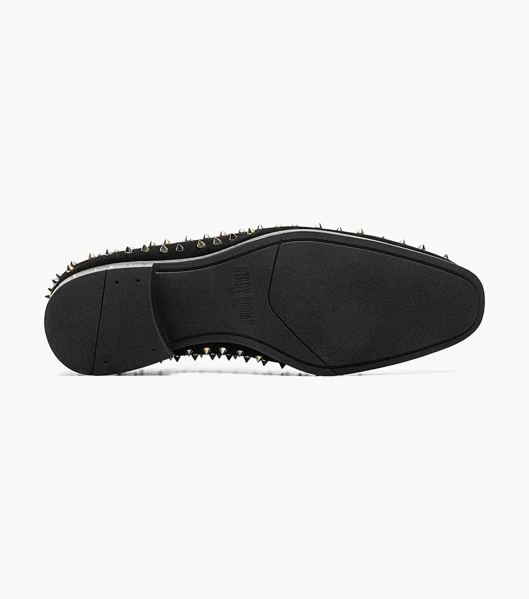 A Stacy Adams SPIRE spiked slip-on loafer in black leather, adorned with silver metal studs.