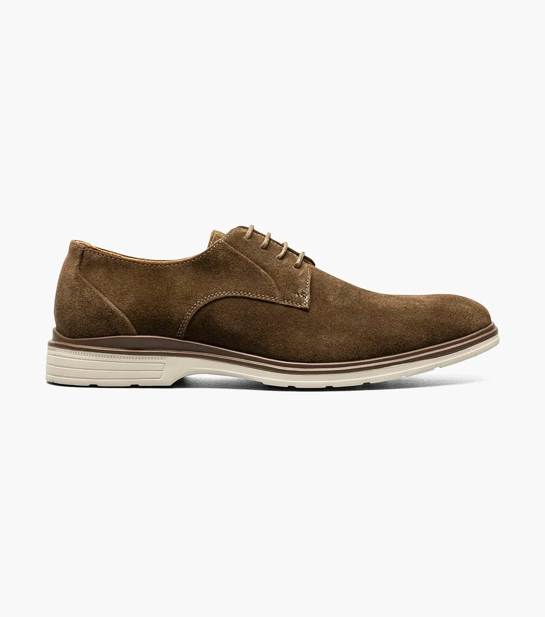 Product: STACY ADAMS presents the TAYSON Plain Toe Lace Up, model 25522-245, featuring a brown suede exterior with a light beige sole and anatomical arch support. This shoe offers a round toe design and laced closure for added comfort and style.