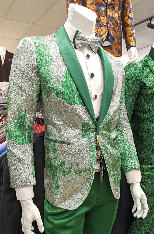 A mannequin in a store is dressed in the INSOMNIA Super Slim Green Blazer by Insomnia, styled with a silver and green patterned suit, green bow tie, and matching pants.