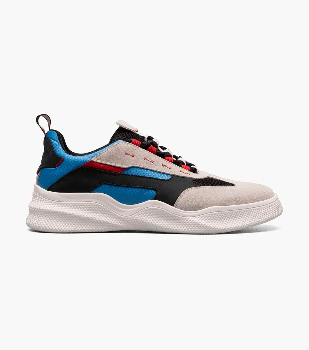 The Stacy Adams Ventura T-Toe Lace Up Sneaker in Chalk Blue Multi (25514-129) from STACY ADAMS boasts a woven black upper with mesh detailing and beige, black, blue, and red accents, along with a white RedZone Footbed.