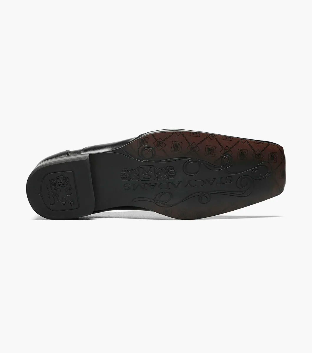 The Stacy Adams - TEMPLIN Bike Toe Loafer in black, designed by STACY ADAMS and identified with model number 24507-001, is a genuine leather shoe boasting a shiny finish and subtle stitching details. It features a cushioned insole for ultimate comfort and is showcased on a plain white background.