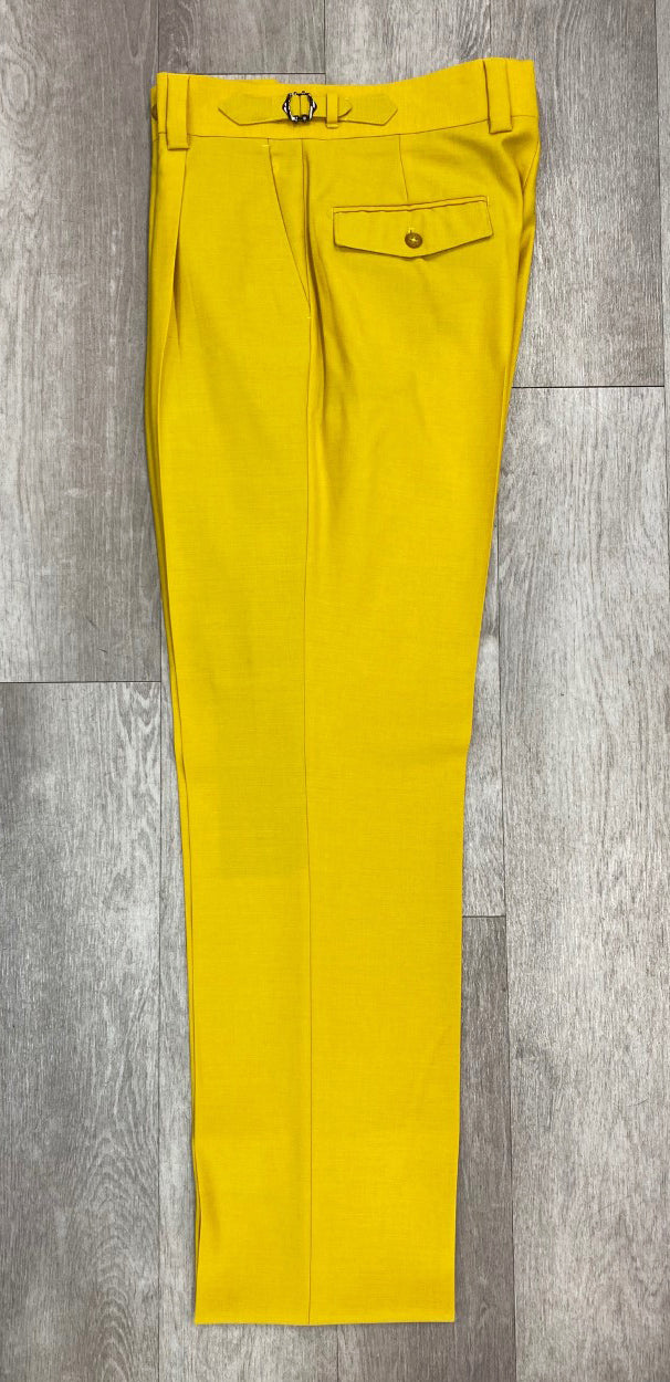 Tiglio Luxe Marbella Solid Yellow Wide Leg Pants in a relaxed fit, designed with a waist belt and flap pocket, gracefully displayed on a wooden floor. 