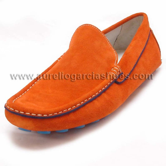 The FI-3117 Red Encore by Fiesso features an orange suede loafer design with visible stitching and blue rubber sole accents, complemented by a cushioned insole for enhanced comfort, set against a white background.