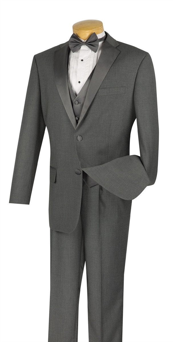 The Vinci Suits regular fit tuxedo, styled as the 4 Piece Tuxedo with Vest Bow Tie in Gray (model 4TV-1), features a sophisticated combination of a gray suit with black satin lapels, complemented by a crisp white dress shirt and a sharp black bow tie. This wrinkle-resistant ensemble is elegantly displayed on a mannequin against a plain background.