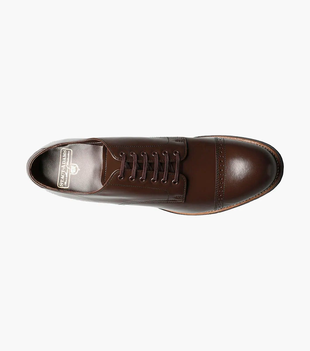 Stacy Adams - MADISON Cap Toe Oxford in luxurious brown kidskin leather, with sleek black laces, gracefully showcased on a white background.