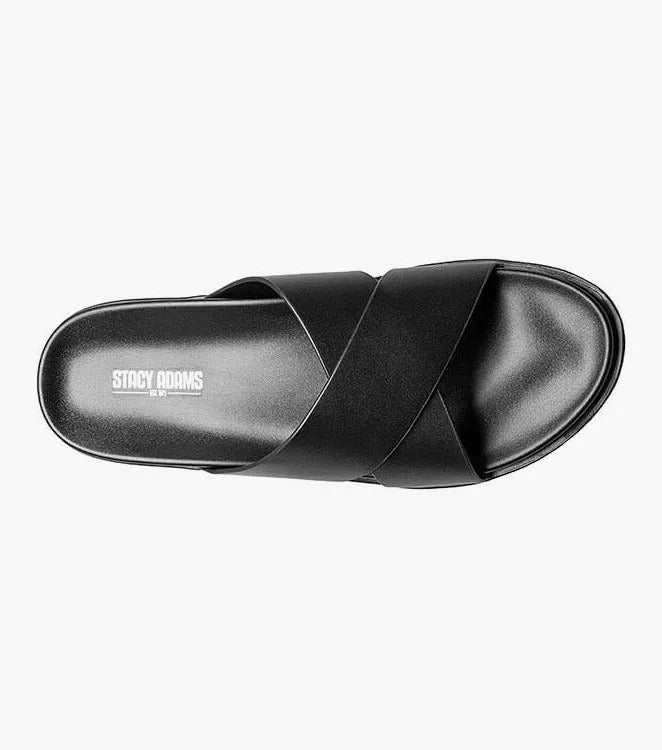 The STACY ADAMS - MONTEL Cross Strap Slide Sandal in Black (Product Number: 25469-001) showcases a sleek design featuring crisscross straps and a comfortable flat sole, complete with a cushioned insole for all-day support.