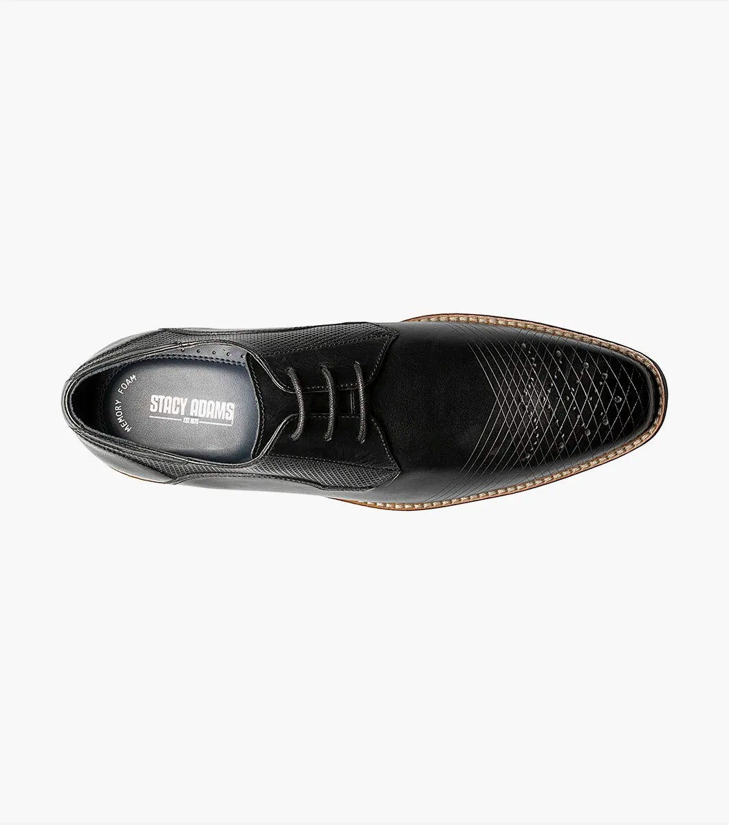 The Stacy Adams - JOVIAN Plain Toe Laser Oxford in black, product code 25504-001, is a premium dress shoe boasting a lace-up closure and distinctive brown detailing on the sole. Made from laser-treated leather for a sleek finish, it includes a Memory Foam insole to enhance comfort.