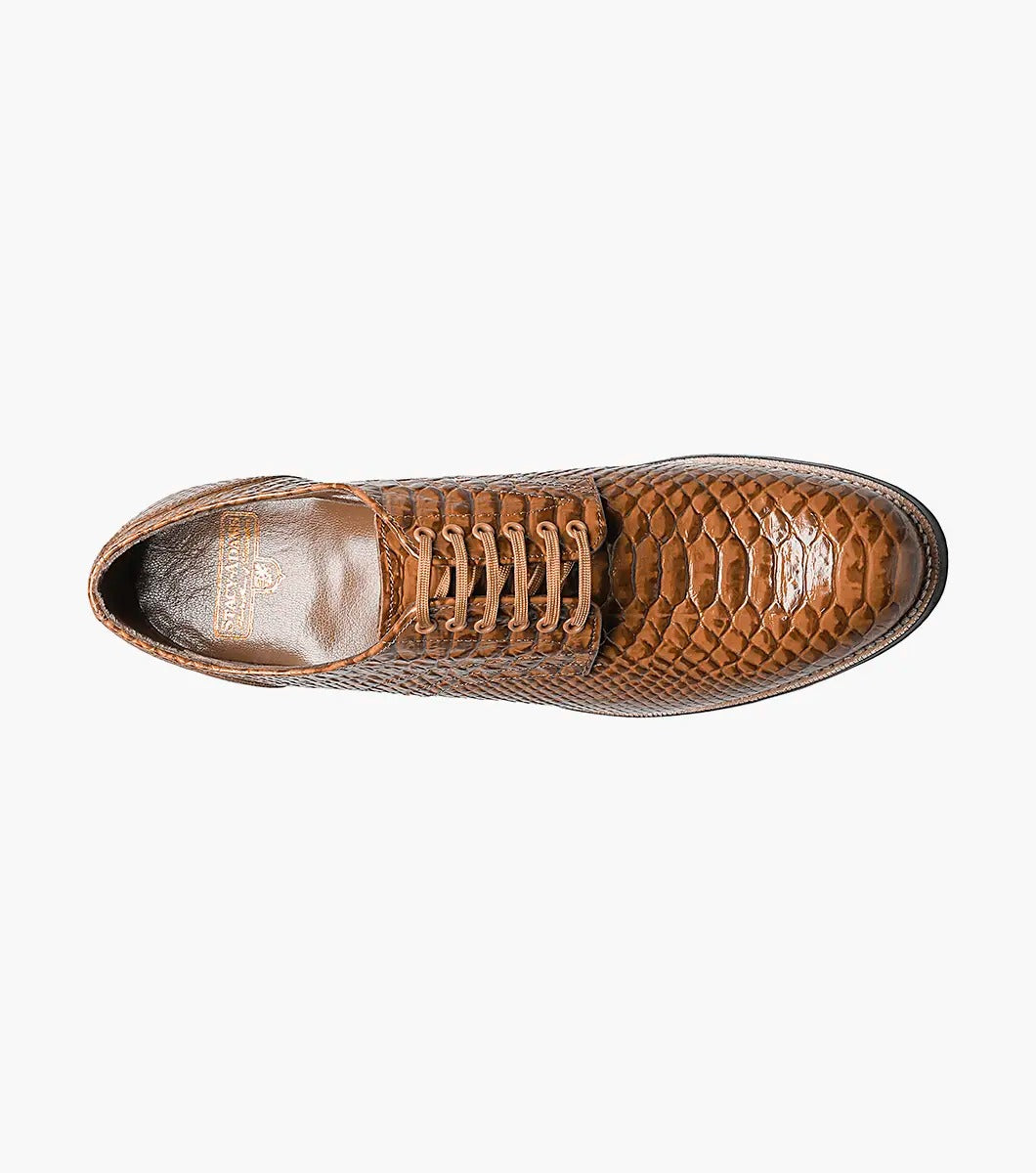 The Stacy Adams - MADISON Anaconda Plain Toe Oxford in tan showcases a lace-up design with a textured anaconda print on brown leather, genuine welt construction, and is complemented by a black sole.