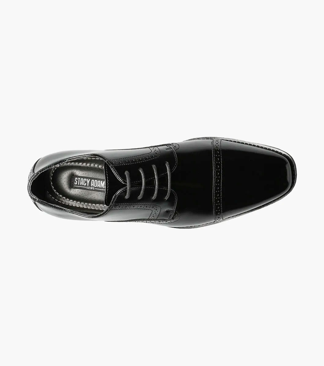 The STACY ADAMS - ABBOTT Cap Toe Oxford in Black (20159-001) is an elegant black dress shoe, made from genuine leather, with a stylish cap toe design, lace-up closure, and a slip-resistant sole, all beautifully showcased against a white background.