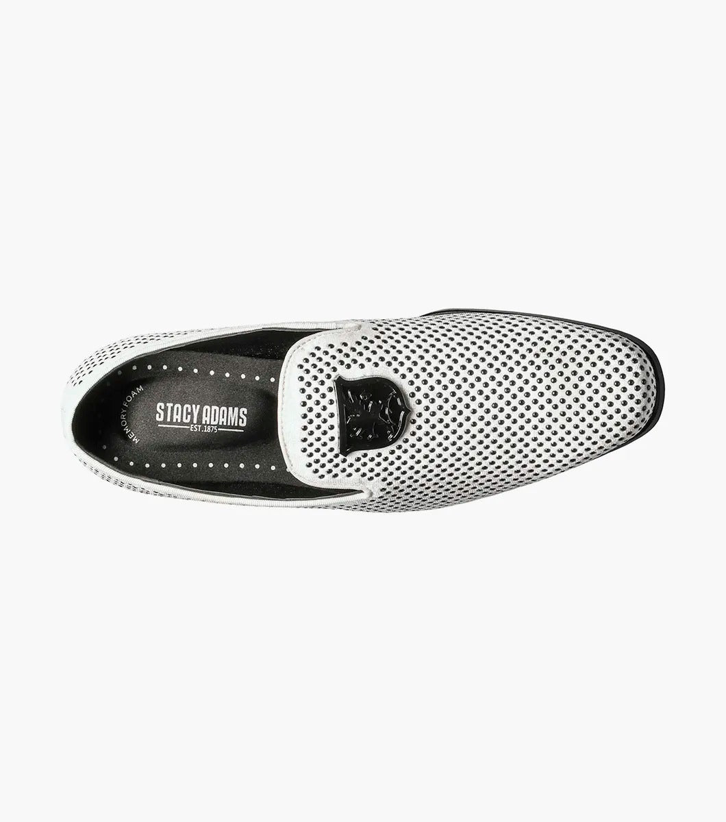 The Stacy Adams - SWAGGER Studded Slip On (Black with White, 25228-111) showcases a striking design with a white studded leather loafer contrasted by a black sole and adorned with a decorative metal emblem on top, offering both style and comfort thanks to its Memory Foam insole.