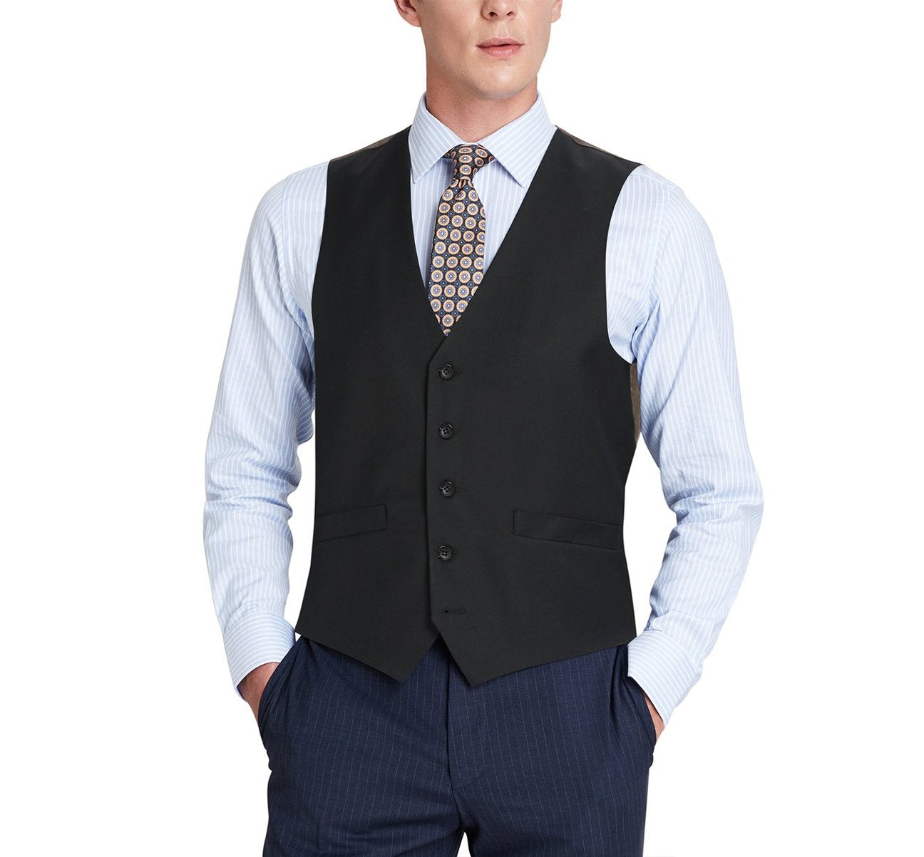 A man in a striped shirt and patterned tie poses confidently with his hands in his pockets, wearing the Alessandro Vitello by Renoir Black Wool Suit Vest, a regular fit dress suit waistcoat.