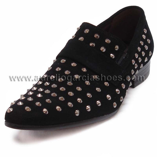 The FI-6713 Black Fiesso By Aurelio Garcia shoe from Fiesso showcases a black suede upper embellished with silver metal studs and features a stylish low heel.