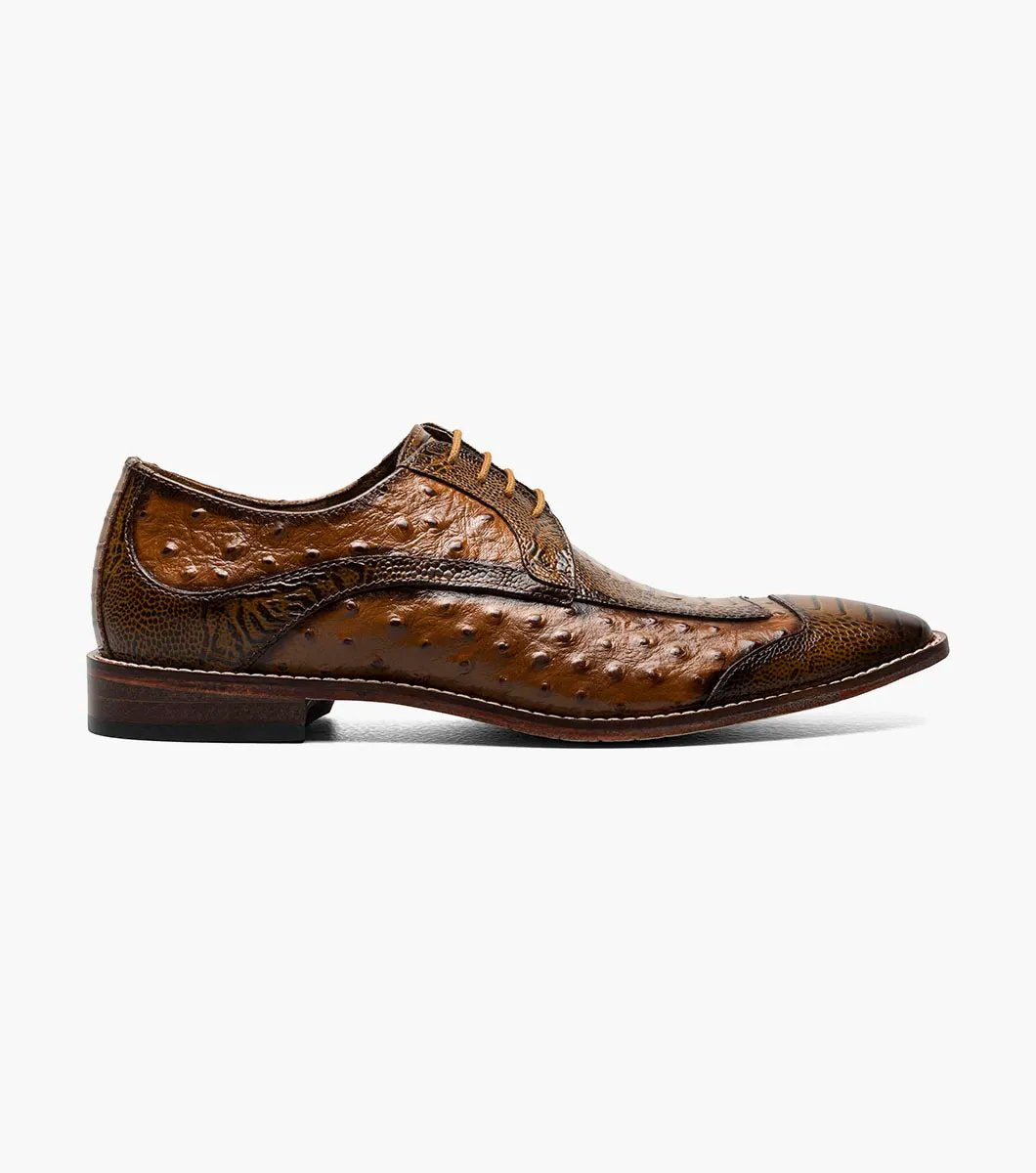 The Stacy Adams - FANELLI Modified Wingtip Oxford in Tan (25536-240) is a classic dress shoe featuring a textured design with laces, a low heel, polished finish, and outstanding arch support.