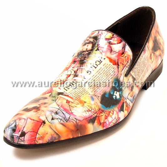 Discover the FI-6793 Magazine Fiesso by Aurelio Garcia: a multicolored slip-on loafer by Fiesso featuring a stylish magazine print design with text and abstract patterns, perfect for elevating any high fashion wardrobe.