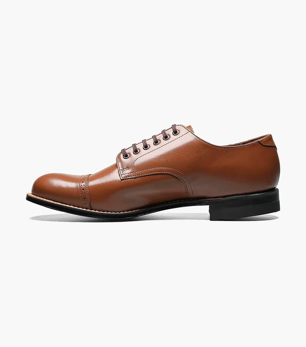 This is a Stacy Adams MADISON Cap Toe Oxford in oak, made from high-quality kidskin leather, with a dark sole and black laces against a white background.