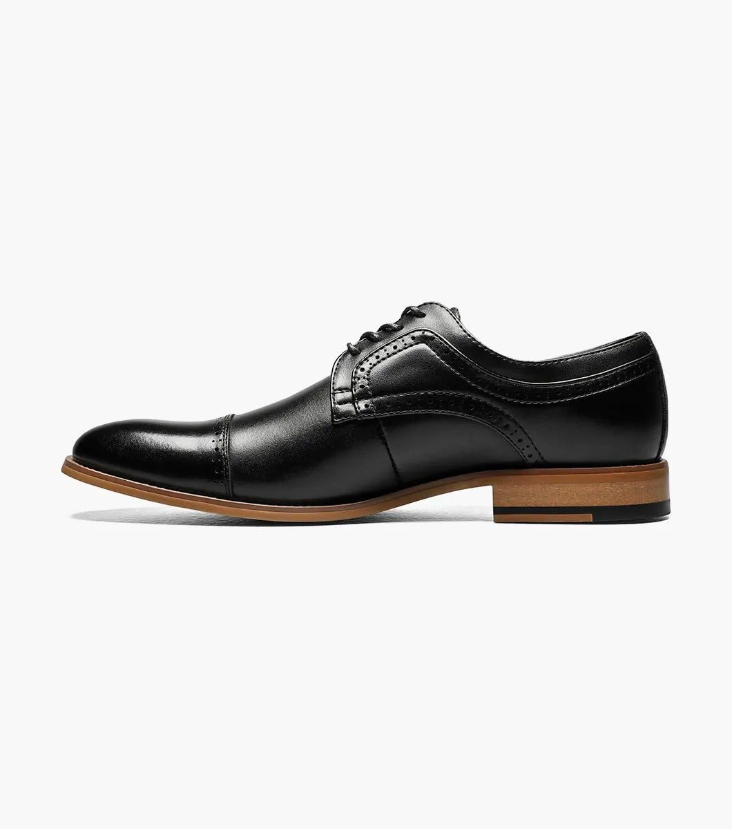 The Stacy Adams DICKINSON Cap Toe Oxford in black features decorative stitching, a brown sole, and a comfortable memory foam insole.