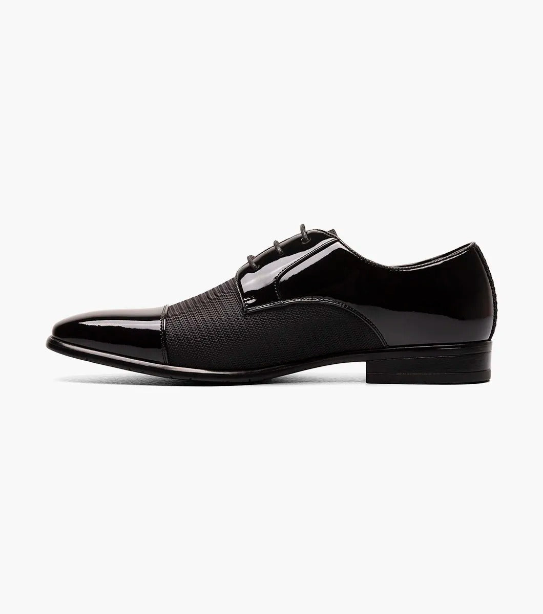 Introducing the Stacy Adams - PHARAOH Cap Toe Oxford in black, a striking formal dress shoe made with polished patent leather and a textured fabric upper. Its lace-up style guarantees an elegant appearance for any event.