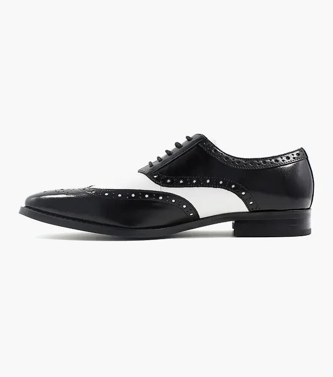 The Stacy Adams TINSLEY Wingtip Oxford in black with white, product number 25092-111, is a stylish shoe crafted from buffalo leather featuring decorative perforations and black laces.