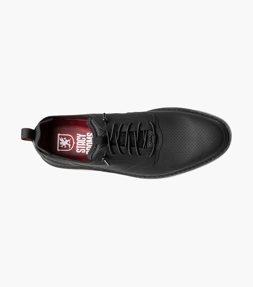 The Stacy Adams SYNCHRO Plain Toe Elastic Lace Up shoe in black (style 25518-001) is a casual dress shoe featuring an elastic lace-up design with a perforated pattern and white sole, complemented by the comfortable RedZone footbed. It is showcased from the side against a simple backdrop.