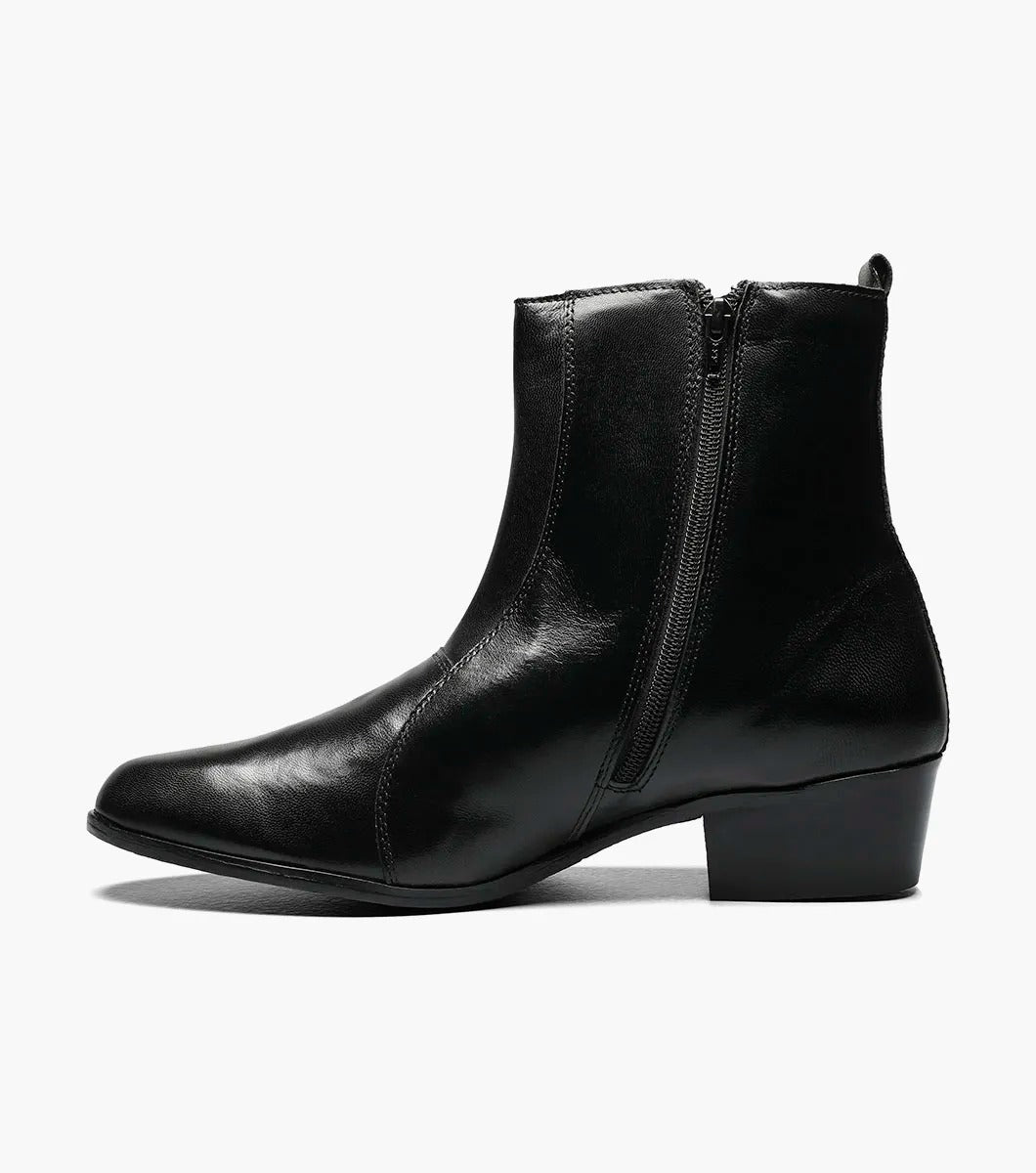 The Stacy Adams - SANTOS Slip On Boot in black showcases a sleek kidskin leather design with a side zipper and a low, angled heel, beautifully set against a white background.