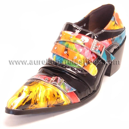 The FI-6771 Black Yellow Fiesso by Aurelio Garcia from the Fiesso brand is a chic dress shoe featuring a multicolored design with pointed toes, decorative straps, and a black and yellow patent leather finish. It boasts a chunky heel and cushioned insoles for added sophistication.