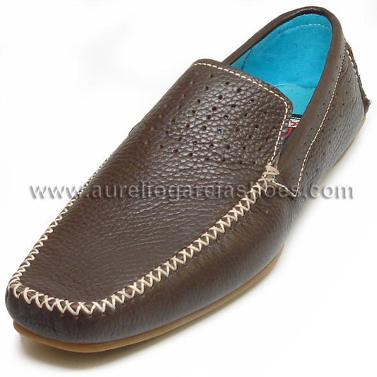 The FI-4001 Brown Fiesso By Aurelio Garcia slip-on leather shoe showcases elegant white stitching, a stylish blue interior, and a cushioned insole for optimal comfort.