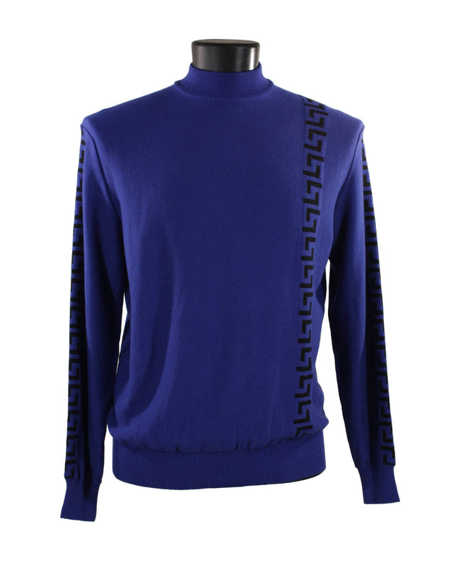 A mannequin dressed in the Bassiri L/S Mock-Neck Blue Sweater 637, featuring a black geometric pattern along the shoulder and sleeves, embodies this stylish piece from Bassiri.