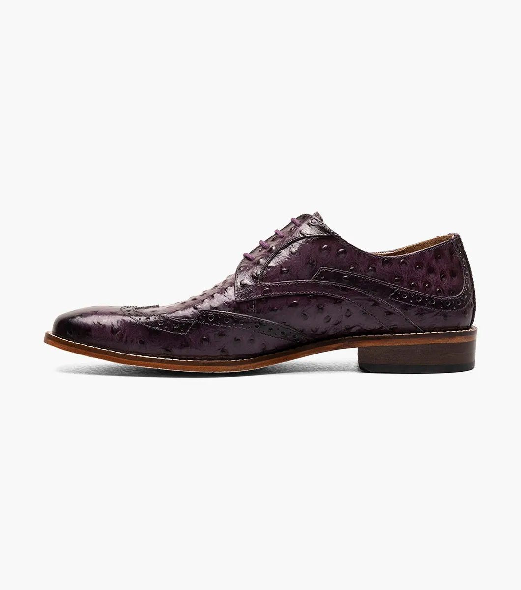 A plum Stacy Adams GENNARO Wingtip Oxford, skillfully crafted from genuine leather with an attractive ostrich quill print texture and featuring a low wooden heel.