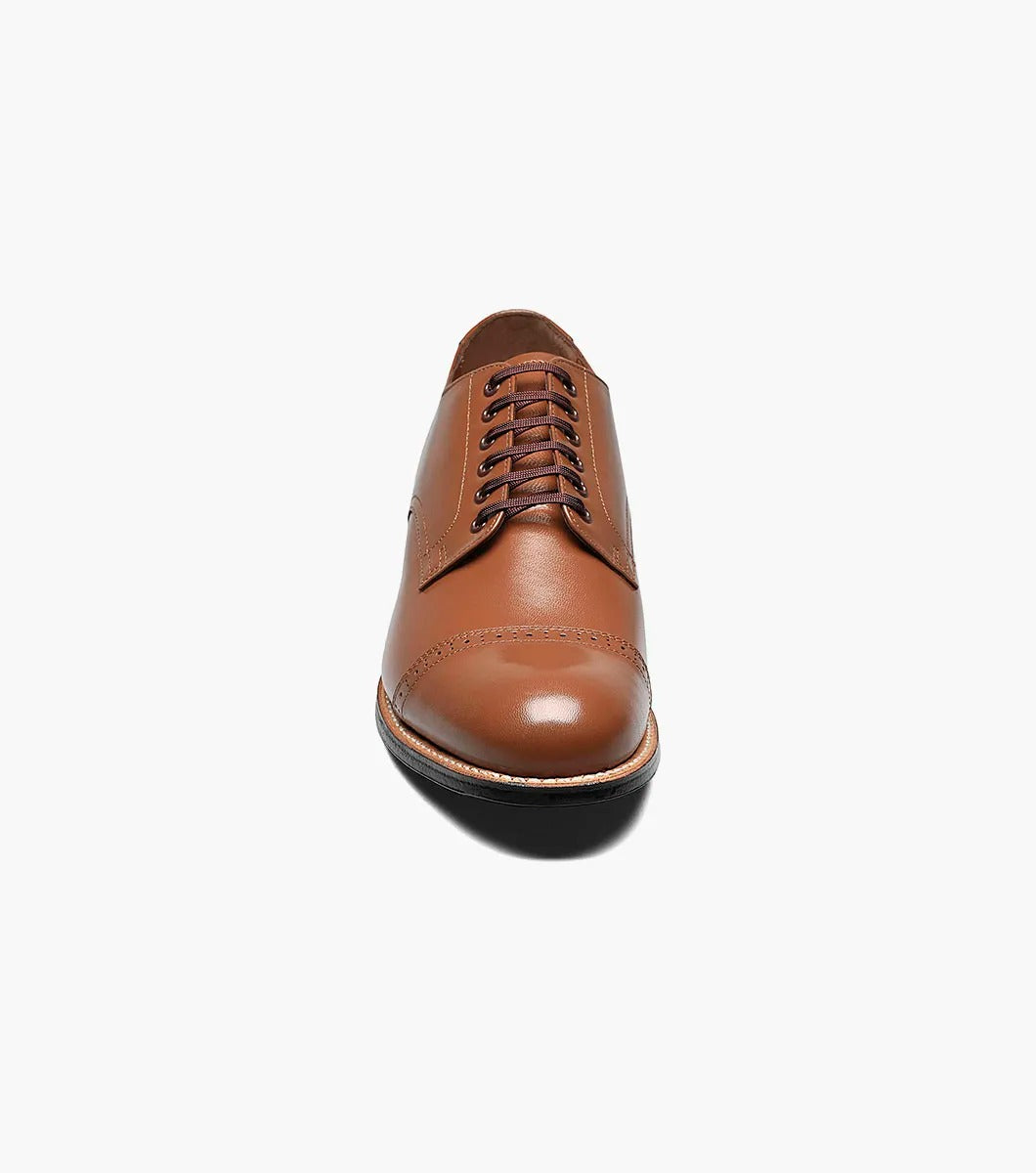 This is a Stacy Adams MADISON Cap Toe Oxford in oak, made from high-quality kidskin leather, with a dark sole and black laces against a white background.