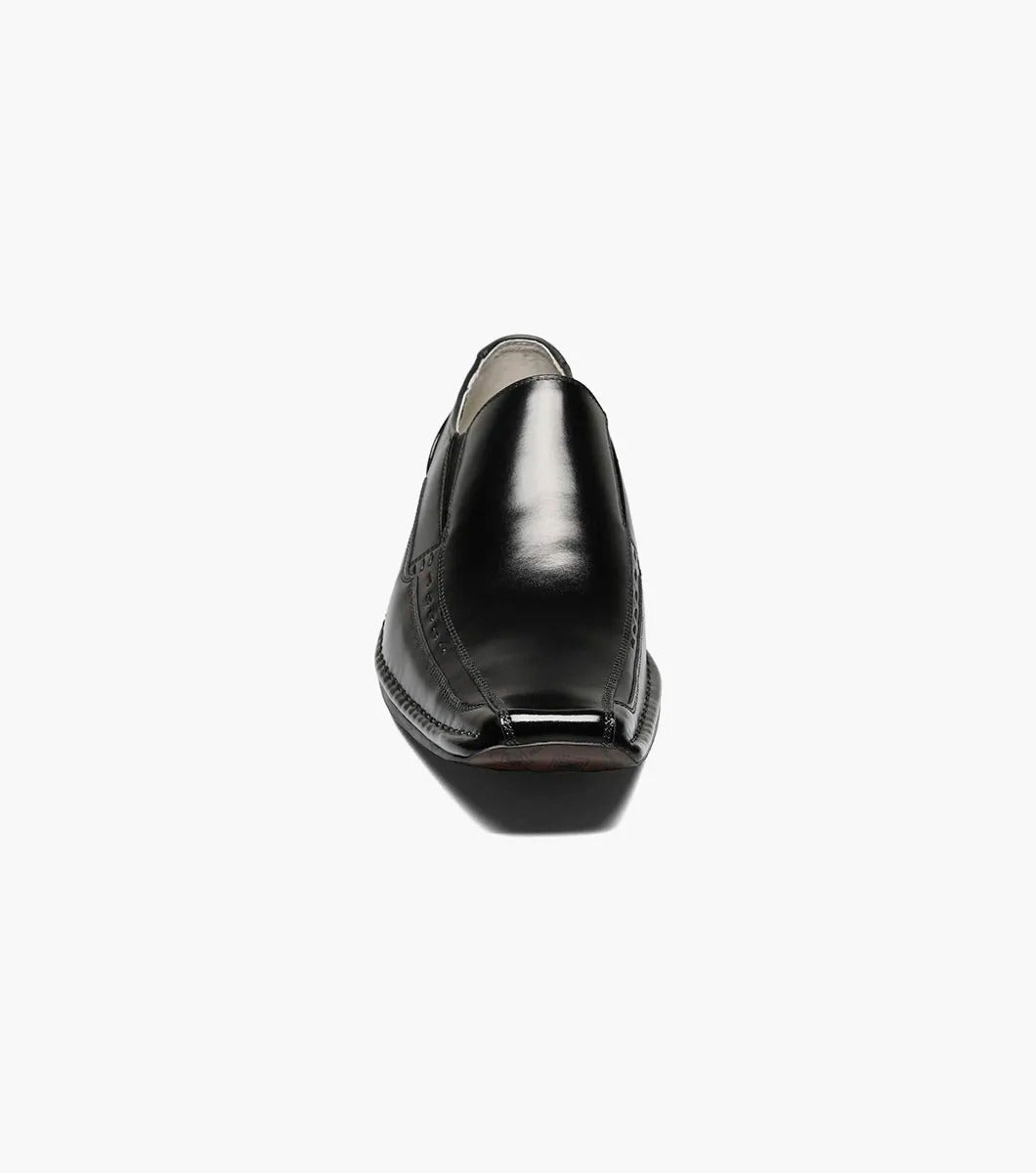 The Stacy Adams - TEMPLIN Bike Toe Loafer in black, designed by STACY ADAMS and identified with model number 24507-001, is a genuine leather shoe boasting a shiny finish and subtle stitching details. It features a cushioned insole for ultimate comfort and is showcased on a plain white background.