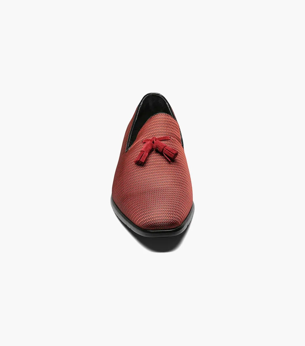 Introducing the Stacy Adams - Tazewell Plain Toe Tassel Slip On in Brick, characterized by its red textured design, black trim, and tassels on top. It features a fully cushioned footbed for ultimate comfort.