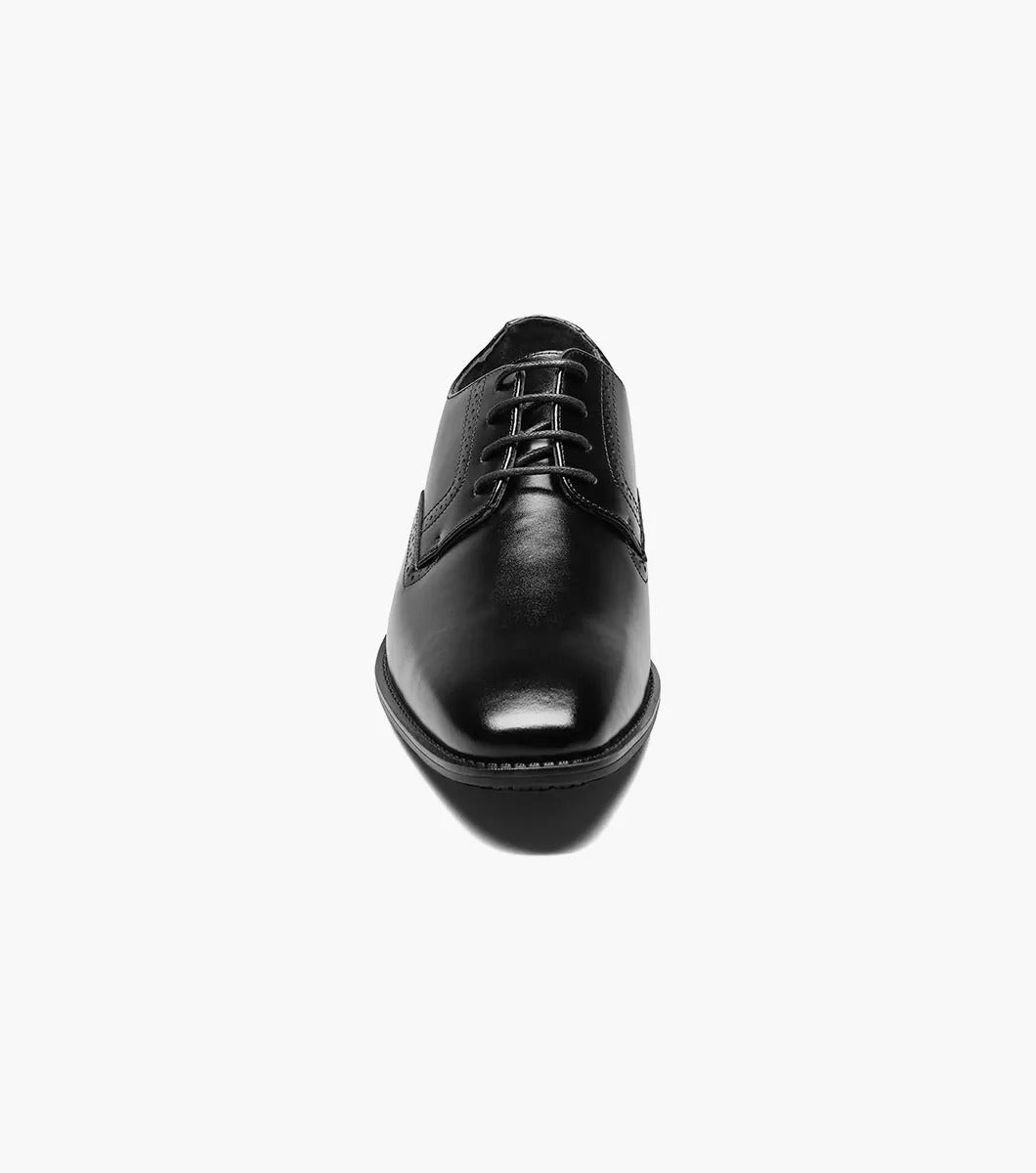 The Stacy Adams ARDELL Plain Toe Oxford in black, featuring a slip-resistant sole and classic laces, is elegantly displayed on a pristine white background.