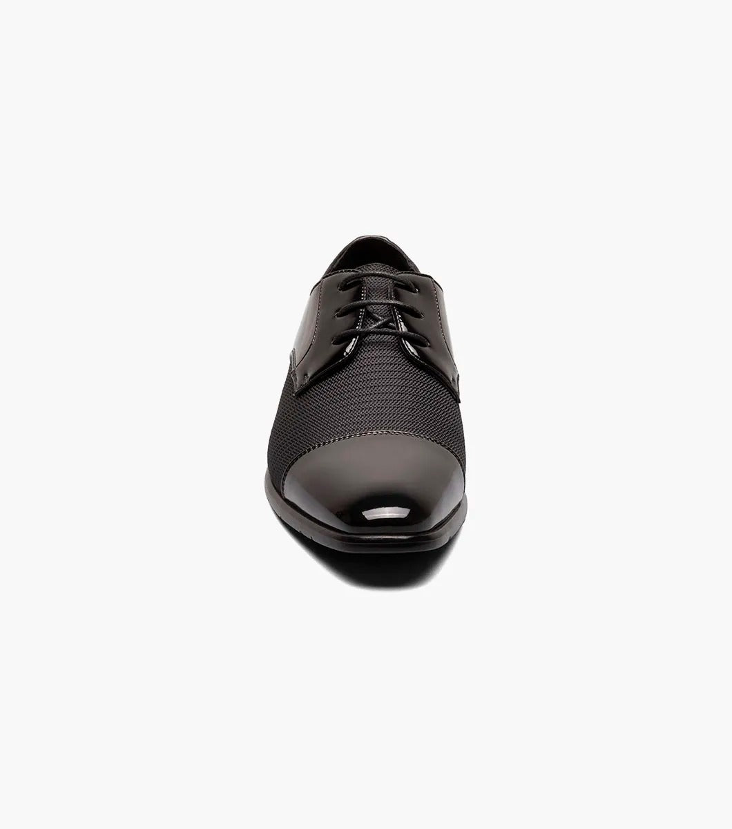 Introducing the Stacy Adams - PHARAOH Cap Toe Oxford in black, a striking formal dress shoe made with polished patent leather and a textured fabric upper. Its lace-up style guarantees an elegant appearance for any event.