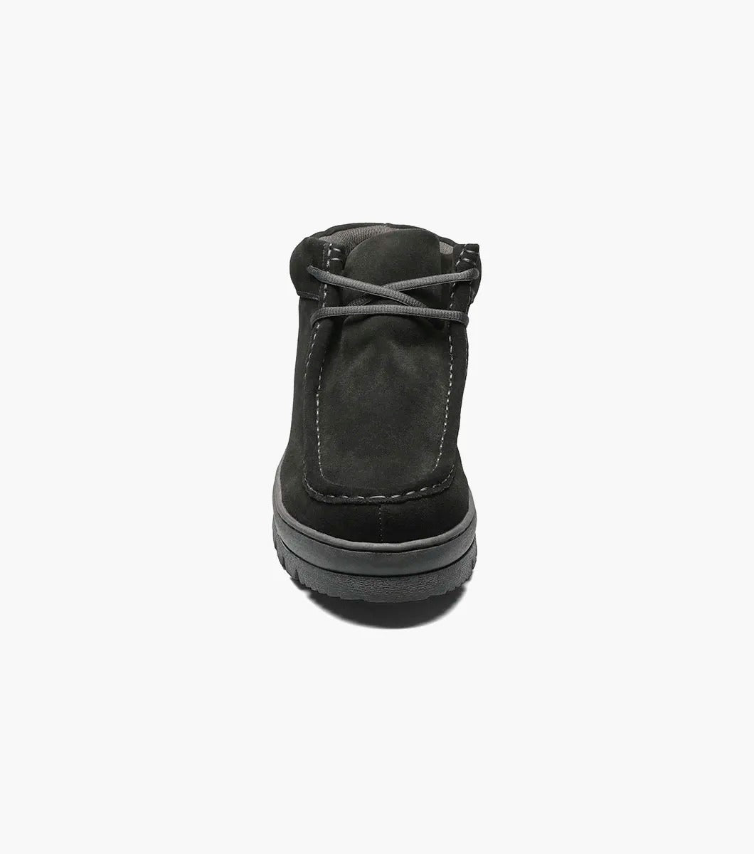 The Stacy Adams - DUBLIN II Moc Toe Boot in black suede, with a thick rubber sole and the signature Moc Toe design, is showcased against a white background.