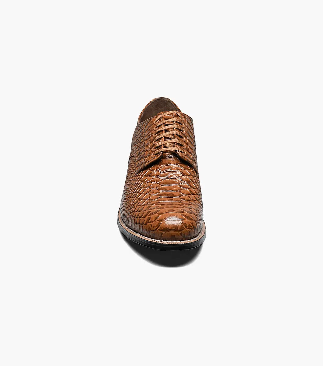 The Stacy Adams - MADISON Anaconda Plain Toe Oxford in tan showcases a lace-up design with a textured anaconda print on brown leather, genuine welt construction, and is complemented by a black sole.