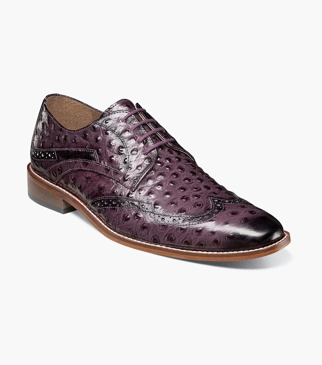 A plum Stacy Adams GENNARO Wingtip Oxford, skillfully crafted from genuine leather with an attractive ostrich quill print texture and featuring a low wooden heel.