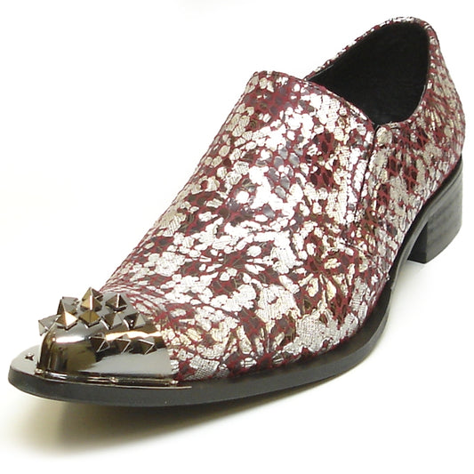 The FI-6842 Red Silver Fiesso by Aurelio Garcia from the brand Fiesso showcases a stylish red and silver floral pattern adorned with metallic studs on the pointed toe, enhanced by a low heel. This elegant slip-on is crafted with a leather upper for extra sophistication and comfort.