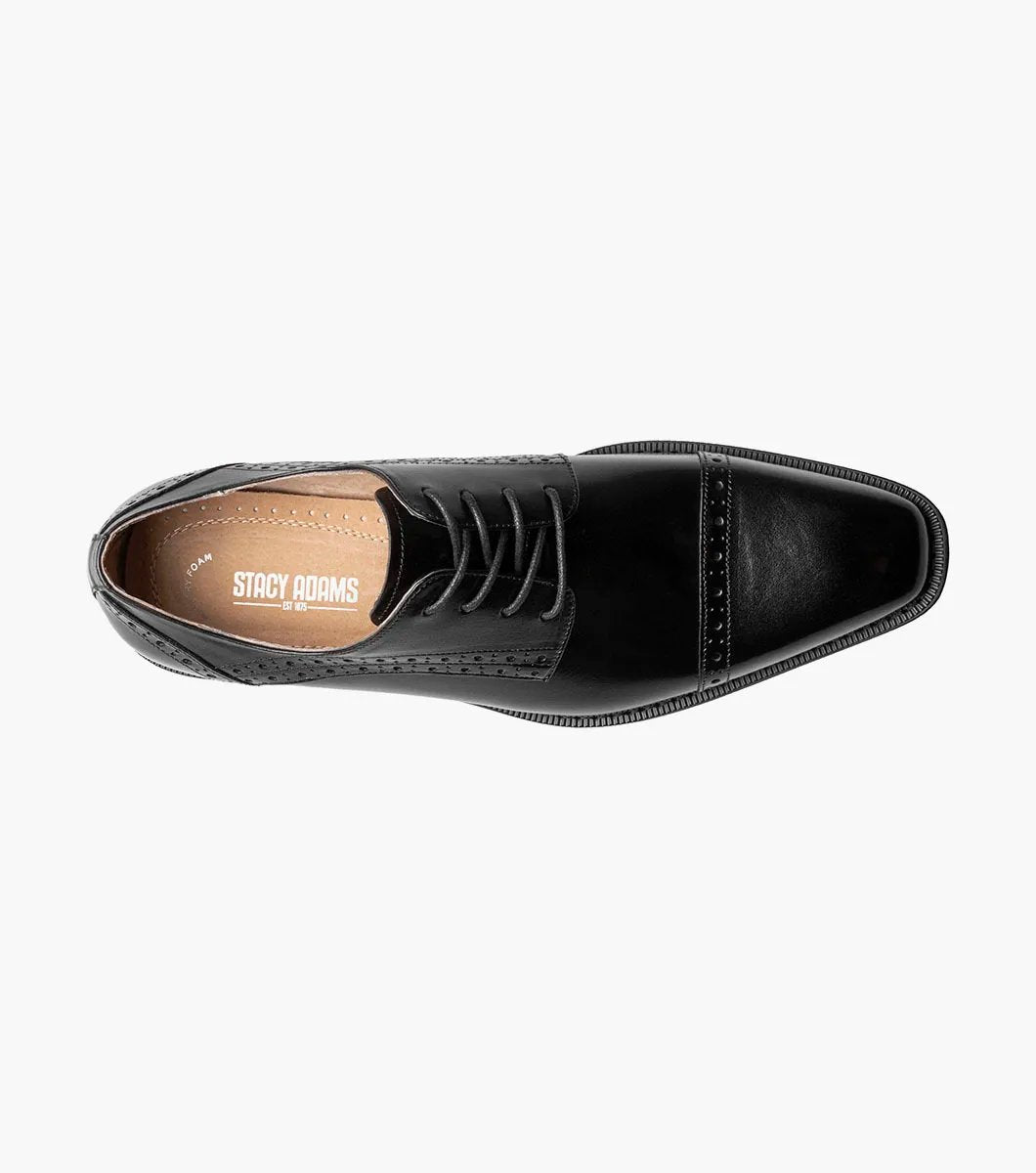 The Stacy Adams - GARRETT Cap Toe Oxford in black, product code 25543-001, is a polished Buffalo leather dress shoe with laces, decorative perforations, and a low heel.