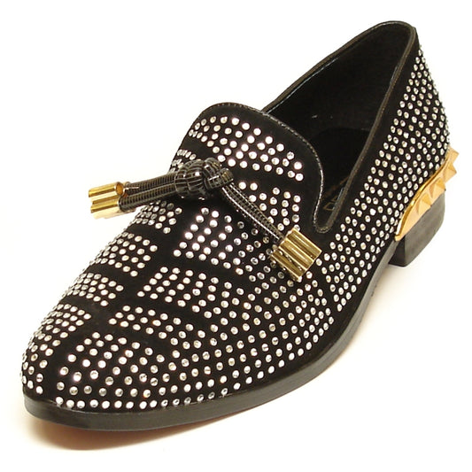 The FI-6958 Black Fiesso by Aurelio Garcia from the brand Fiesso is a stylish slip-on leather loafer featuring gold accents on the heel, tassels, and black studded detailing. It offers ultimate comfort with its cushioned insole.