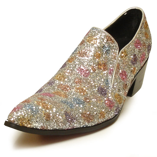 The FI-6977 Rose Fiesso by Aurelio Garcia, from the brand Fiesso, is a fashion-forward shoe that showcases a multicolored glittery design. It features a leather upper, low block heel, and pointed toe, along with a cushioned insole for enhanced comfort.