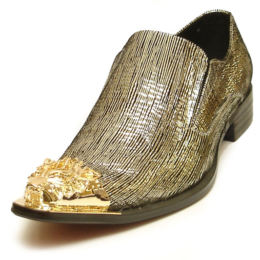 Introducing the FI-6981 Gold Slip on Metal Tip by Fiesso, a stunning creation from Aurelio Garcia. This fashion shoe features a metallic texture, luxurious leather upper, and is adorned with decorative gold embellishments on the toe.