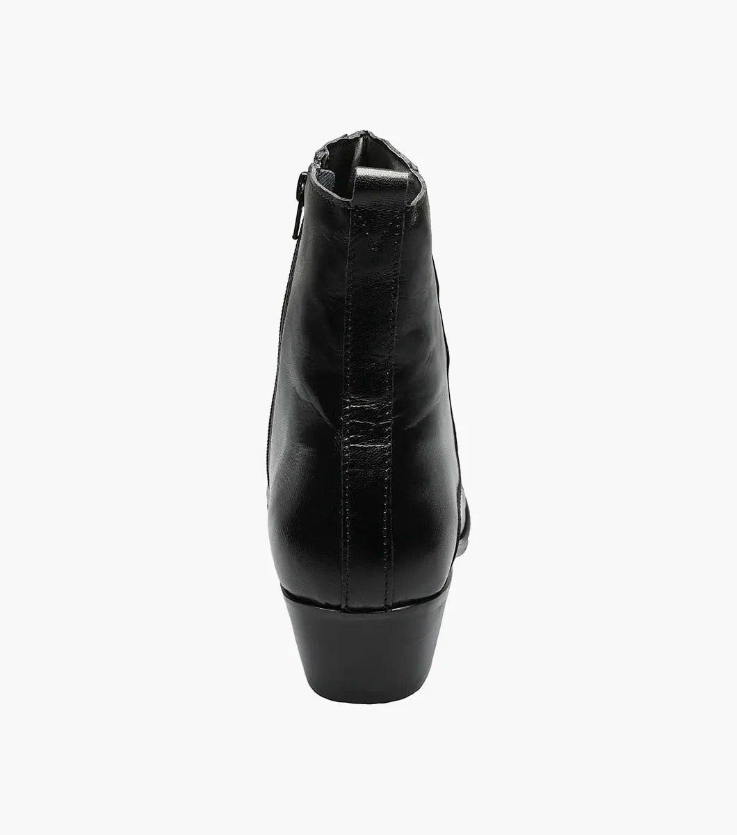 The Stacy Adams - SANTOS Slip On Boot in black showcases a sleek kidskin leather design with a side zipper and a low, angled heel, beautifully set against a white background.