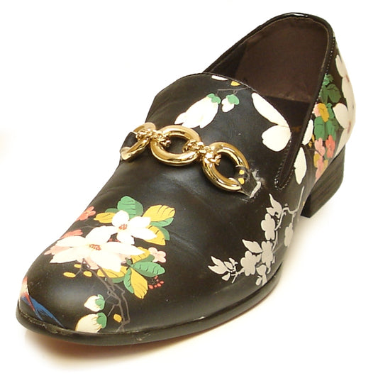 The FI-7054 Black shoe from Fiesso by Aurelio Garcia is a black floral loafer featuring a leather upper and adorned with a gold chain detail on the front, showcasing the brand's signature style.